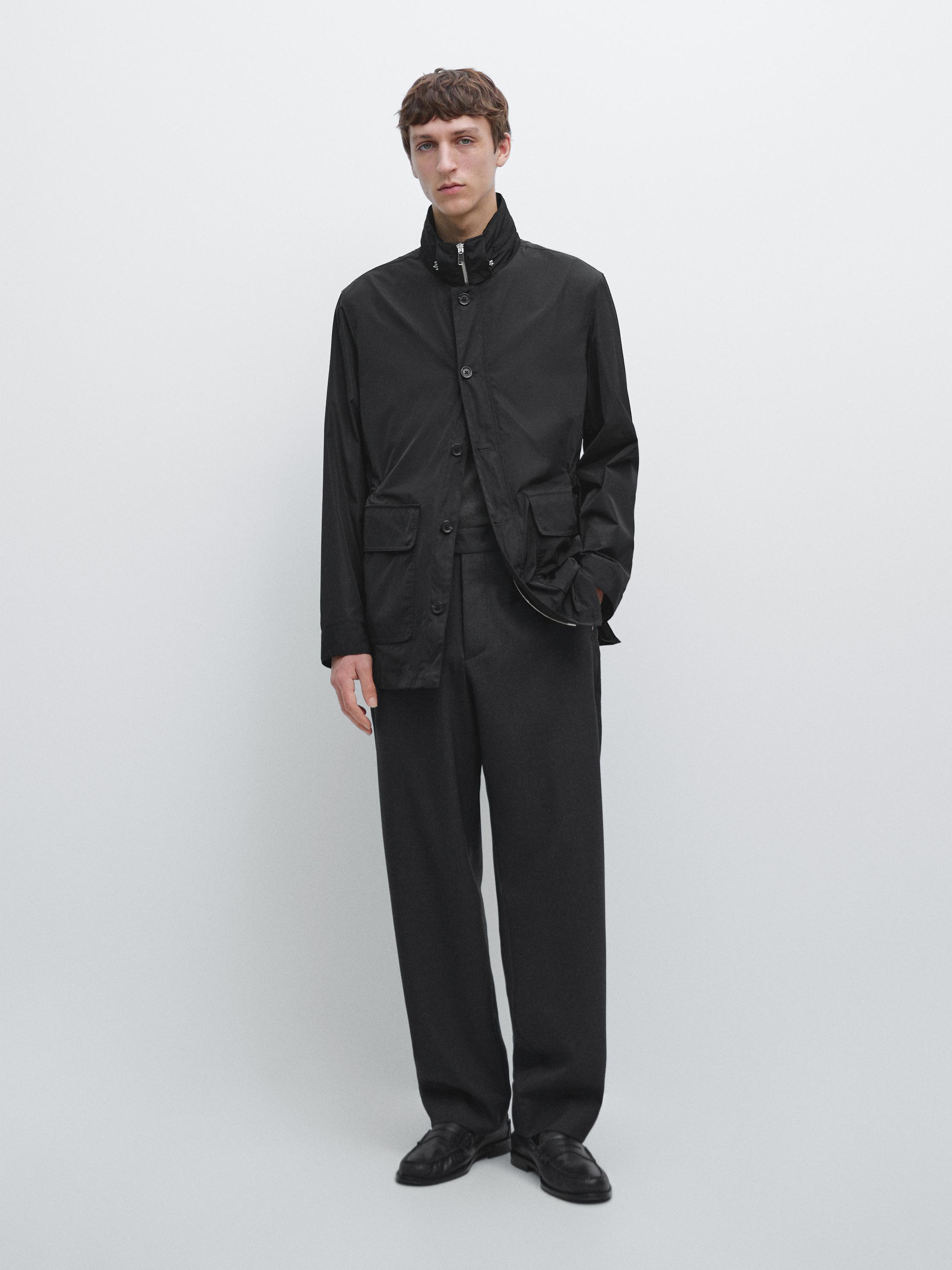 Hooded parka with fabric detail